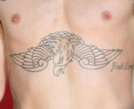 Eagle Tattoo Adam Levine | the pay phone singer also has an etching style design of Eagle Tattoo Adam Levine | the pay phone singer also has an etching style design of