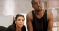 Kanye West and Kim Kardashian on bed