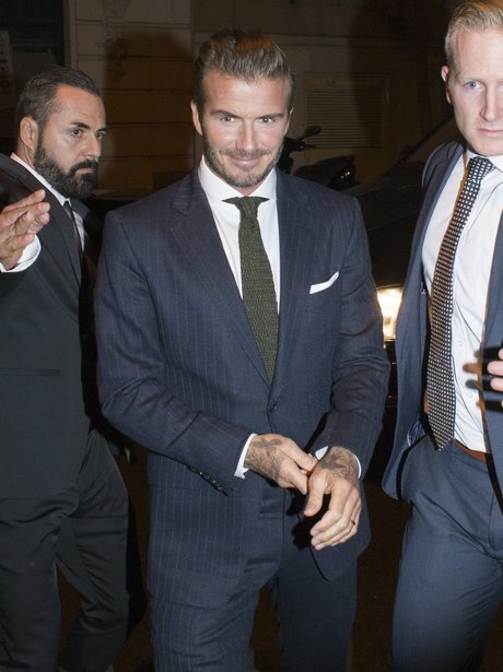 Dapper as ever! Can anyone else rock a suit as well as David Beckham ...